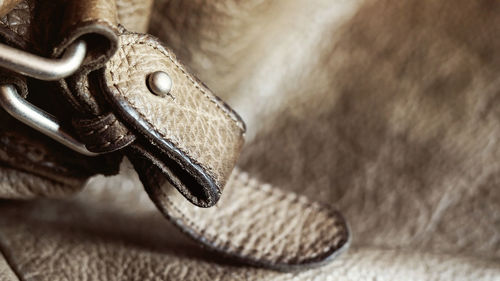 Close-up of old shoes on table