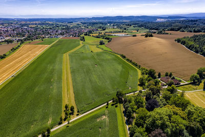 High angle view of trees on field against sky