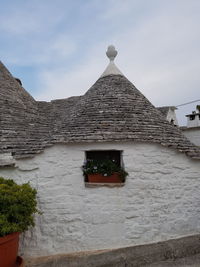 Low angle view of traditional building against sky