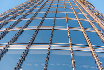 Low angle view of building against blue sky