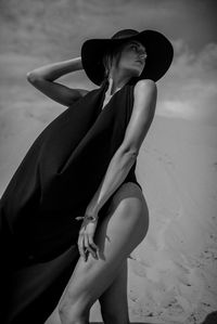 Woman standing at beach