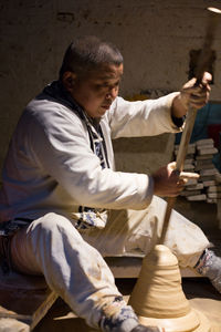 Full length of man playing at music concert