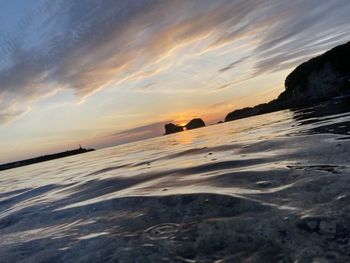 Scenic view of sea against sky during sunset