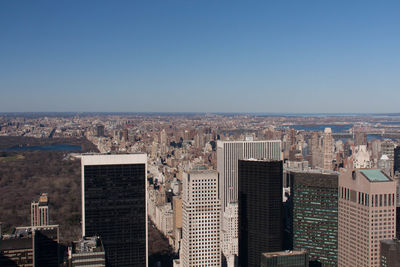 High angle view of buildings against clear sky