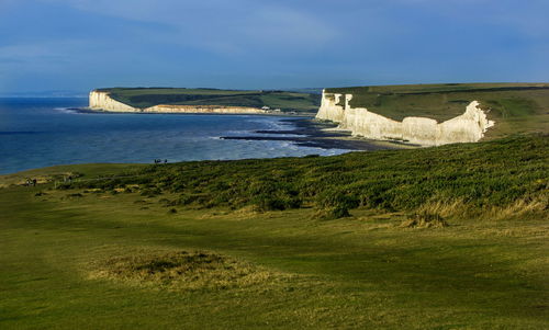 Idyllic shot of seven sisters against sky