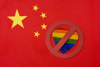 Close-up of flag against red background