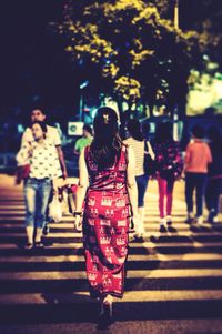 Full length of woman standing in park