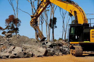 Low angle view of construction site against clear sky