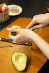 High angle view of person preparing food on table