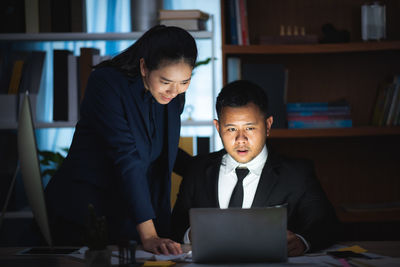 Man working on table in office