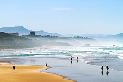 Scenic view of beach against clear sky