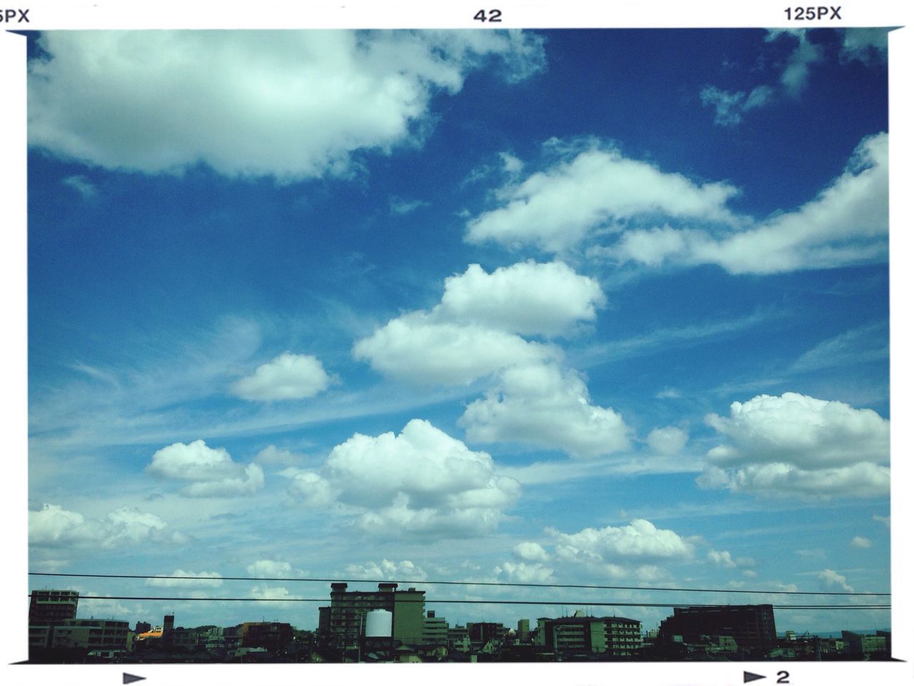 transfer print, sky, cloud - sky, auto post production filter, low angle view, cloud, built structure, cloudy, architecture, blue, building exterior, day, outdoors, power line, no people, nature, connection, tranquility, electricity pylon, sunlight