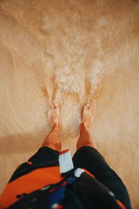 Low section of man on beach