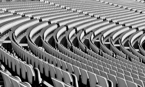 High angle view of empty chairs in stadium