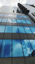 Low angle view of modern building against sky