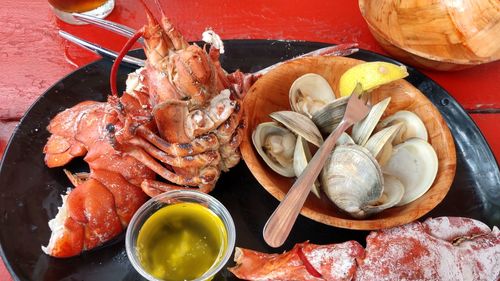 High angle view of shells in plate on table