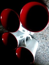 Close-up of red object on table