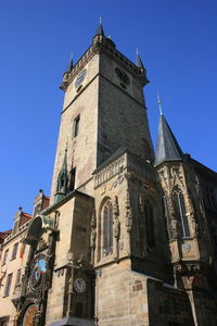 Low angle view of building against clear blue sky