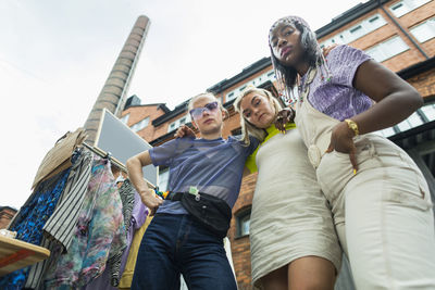 Young friends at yard sale