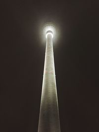 Low angle view of illuminated building at night