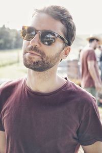 Portrait of young man wearing sunglasses