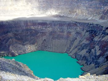 High angle view of lake amidst rocks