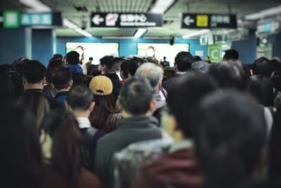 Rear view of people in bus