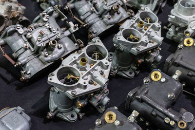 Group of steel car carburetor for sale - car spare part.