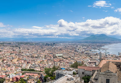 Aerial view of town against sky
