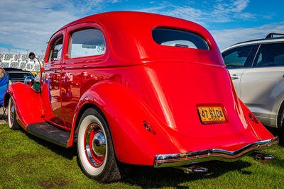 Vintage car parked on field