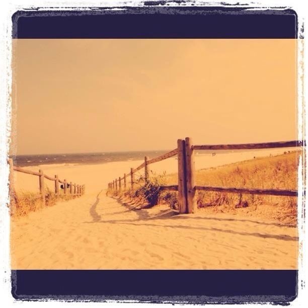 sea, horizon over water, transfer print, beach, water, clear sky, sand, auto post production filter, shore, the way forward, tranquility, tranquil scene, scenics, sky, nature, copy space, pier, beauty in nature, sunlight, railing