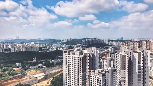 High angle view of buildings against sky