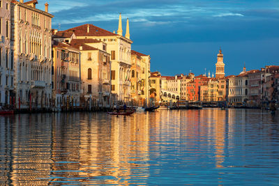 Canal passing through city buildings