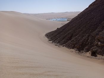 Scenic view of desert against sky