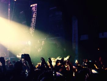 People enjoying music concert