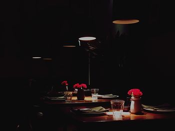Table and chairs in illuminated room