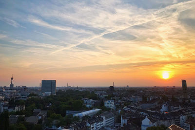 High angle view of buildings against sky during sunset