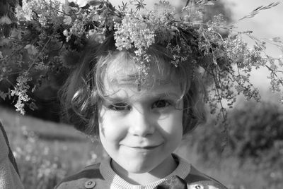 Close-up portrait of girl with flower crown