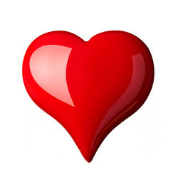 Directly above shot of red heart shape on white background