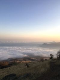 Scenic view of landscape against sky during sunset