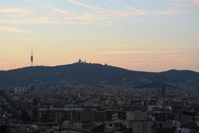 High angle view of city at sunset