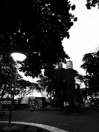 Water tower against sky in city