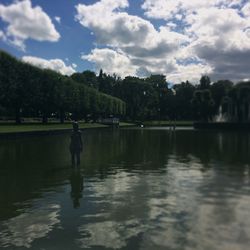 Rear view of a man in water