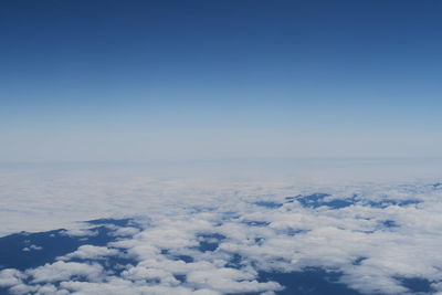 Aerial view of cloudscape against blue sky