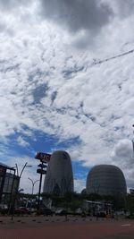 Low angle view of factory against sky