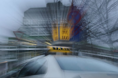 Blurred motion of car in city