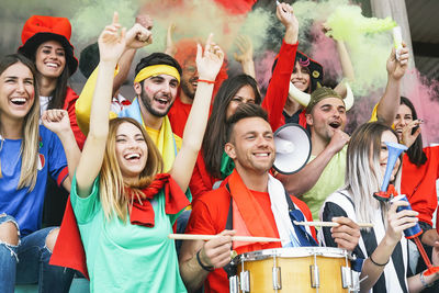 Fans cheering in stadium