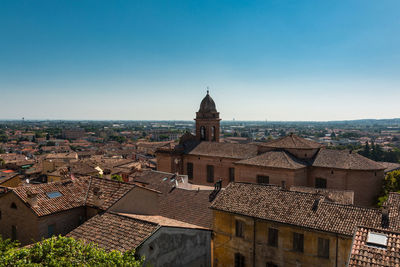 High angle view of buildings in city against sky