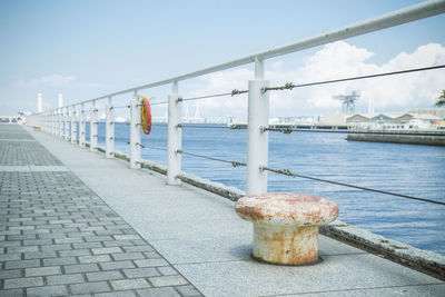 Pier over sea against sky