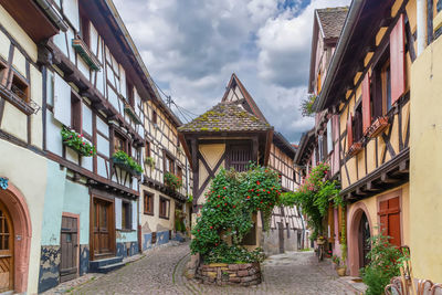 Picturesque historical street in eguisheim, alsace, france